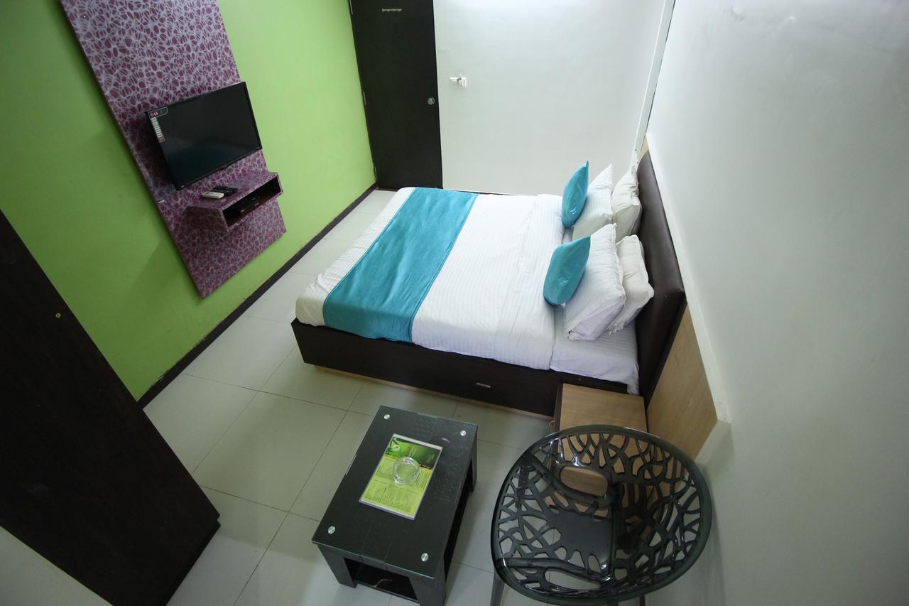 Hotel Hillton Gandhinagar Bagian luar foto